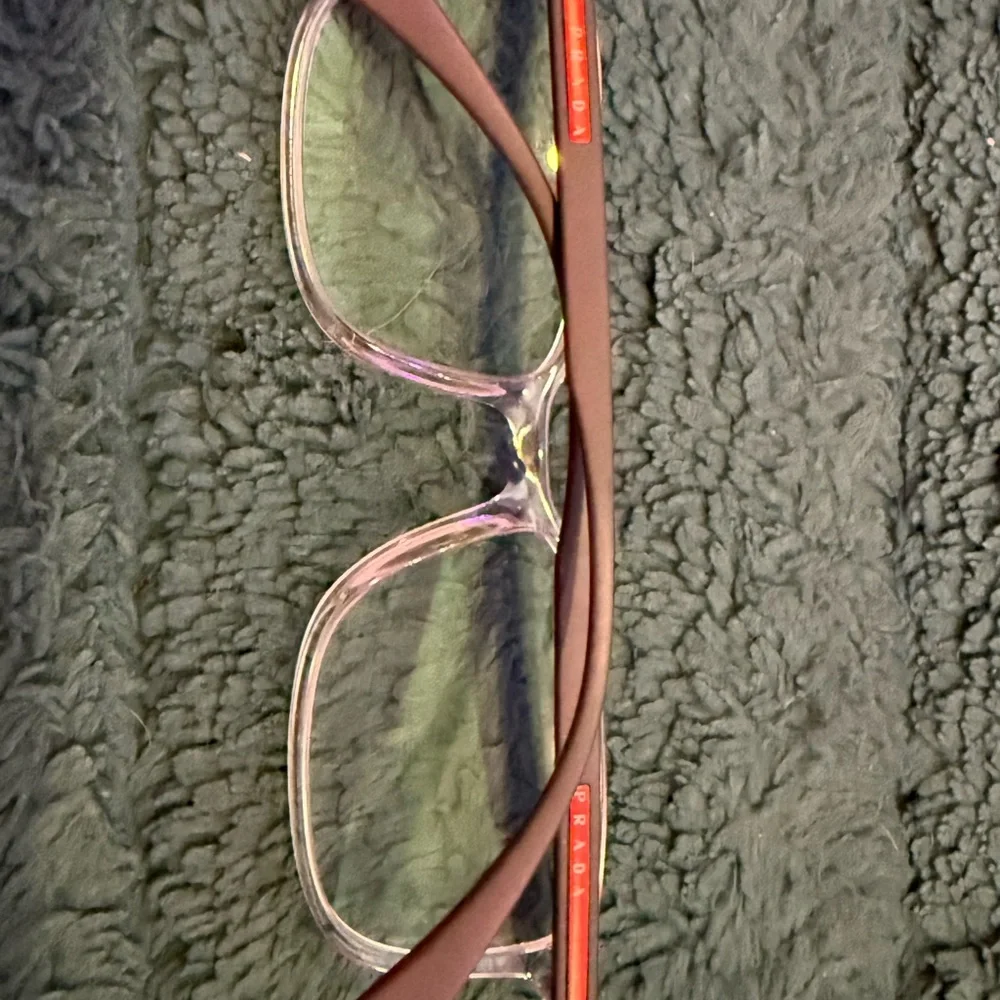 Prada Clear Frame Rectangular Glasses - Picture 2 of 5